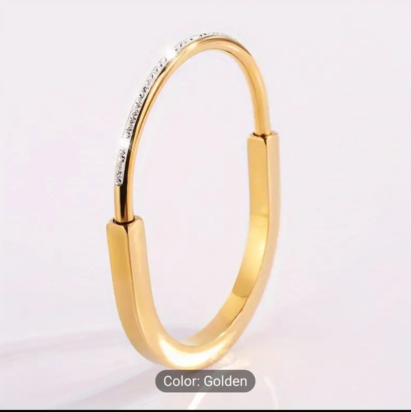 Jewelry - 💛💛NEW💛💛 BEAUTIFUL!! Stainless Steel Lock Bangle Bracelet in GOLD w/Half CZ'S